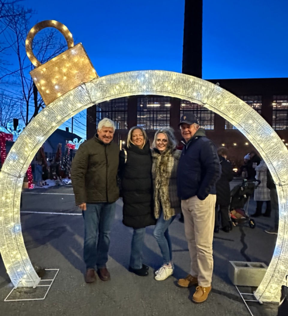 A family under the light arch