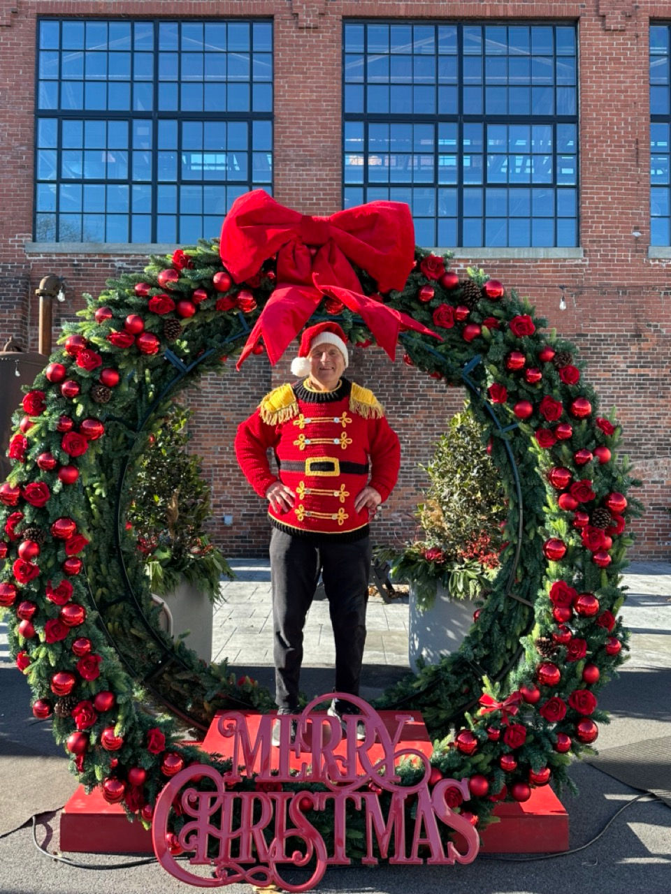 A nutcracker in the giant wreath
